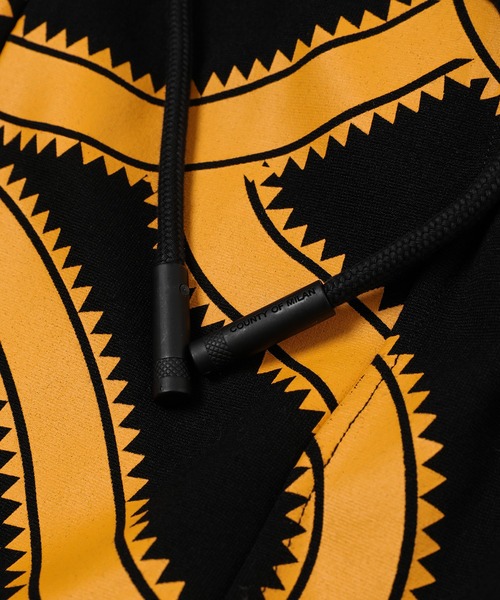 MARCELO BURLON（マルセロ・バーロン）の「ALL OVER SNAKES TRACK PANTS（その他パンツ・メンズ・ブラック系その他・M/L）」の3枚目の写真