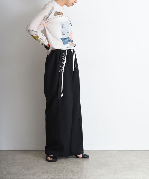 Eimee Law（エイミーロウ）の「テープロゴ エンブロ ゆるスラックスパンツ（スラックス・レディース・ライトブルー/ライトベージュ/ブラック・FREE）」の9枚目の写真