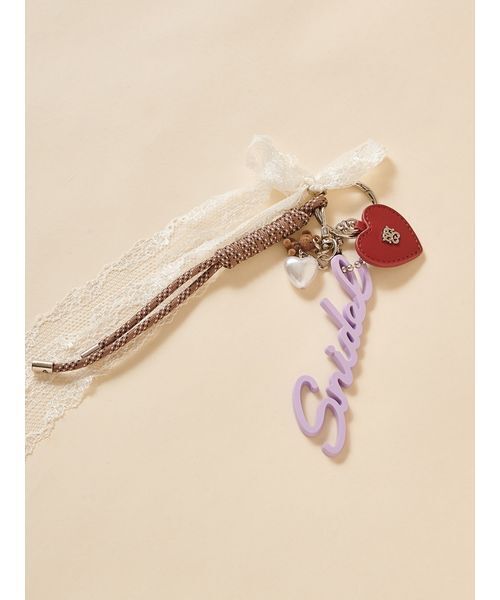 SNIDEL(スナイデル)の「ラバーロゴチャーム(チャーム・レディース・マスタード/ラベンダー/ホワイト・F)」の1枚目の写真