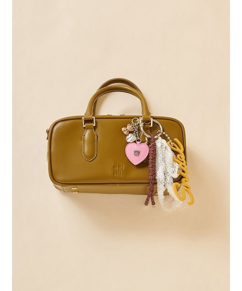 SNIDEL(スナイデル)の「ラバーロゴチャーム(チャーム・レディース・マスタード/ラベンダー/ホワイト・F)」の5枚目の写真