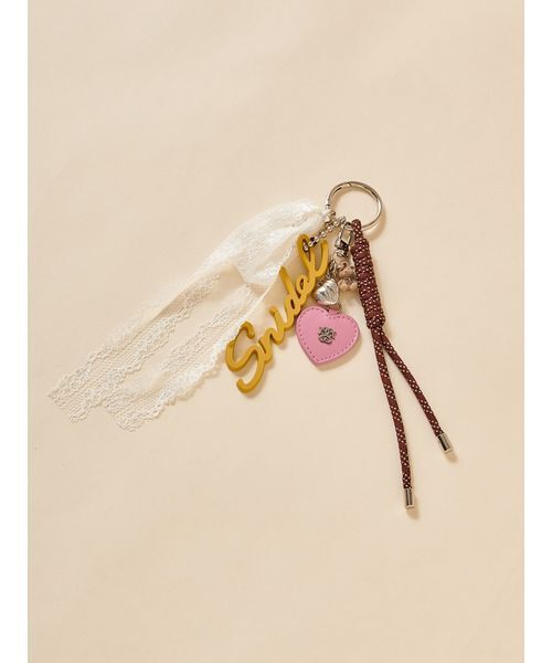 SNIDEL(スナイデル)の「ラバーロゴチャーム(チャーム・レディース・マスタード/ラベンダー/ホワイト・F)」の6枚目の写真