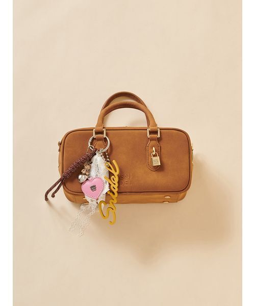 SNIDEL(スナイデル)の「ラバーロゴチャーム(チャーム・レディース・マスタード/ラベンダー/ホワイト・F)」の7枚目の写真