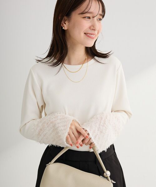 Green Parks(グリーンパークス)の「袖フェザードッキングプルオーバー(Tシャツ/カットソー・レディース・ホワイト系その他2/ブラック・FREE)」の1枚目の写真