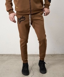 STUD MUFFIN（スタッドマフィン）の「mp15047- T-Rストレッチポンチ ターゲットベアサガラパッチワーク-フロッキー ジョグパンツ(624-06293)（スウェットパンツ）」