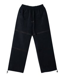 S'EST（エスイーエスティー）の「NYION TAPING PANTS - BLACK（スウェットパンツ）」