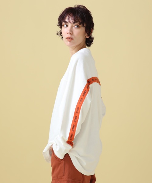 AVIREX(アヴィレックス)の「BACK LOGO TAPE TOPS/ バックロゴテープトップス(Tシャツ/カットソー・レディース・ブラック/ホワイト系2・F)」の1枚目の写真