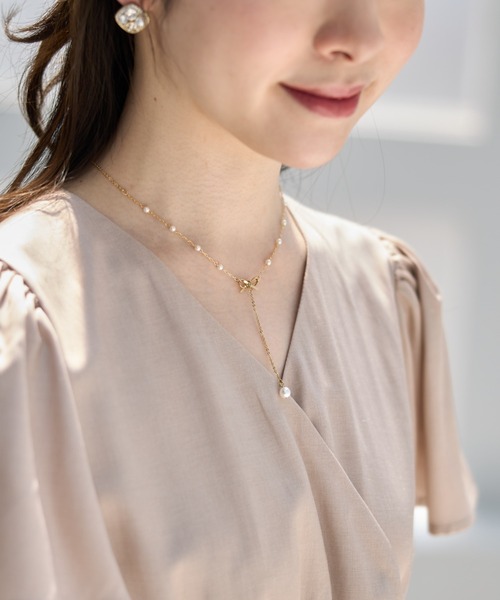 tocco closet（トッコ　クローゼット）の「リボン×パールネックレス（ネックレス・レディース・ゴールド・FREE）」の7枚目の写真