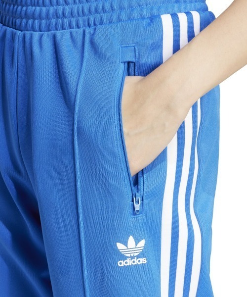 adidas(アディダス)の「adidas Originals ADICOLOR CLASSIC TRACK PANT REGULAR TAPERED LEG(アディダスオリジナルス ベッケンバウアー トラックパンツ(ジャージ))(その他パンツ・レディース・ブラック/ダークブルー・SMALL/X-LARGE/LARGE/MEDIUM)」の10枚目の写真