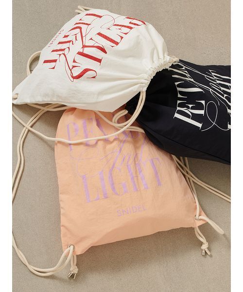 SNIDEL（スナイデル）の「タイプナップサック（バックパック/リュック・レディース・ホワイト/ダークネイビー/オレンジ・F）」の4枚目の写真