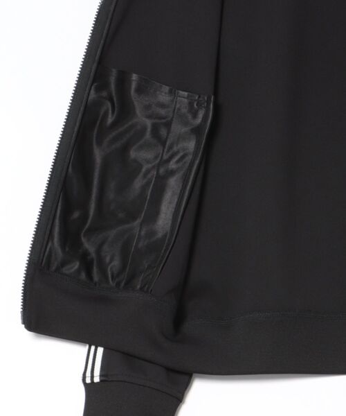 THE NORTH FACE(ザノースフェイス)の「THE NORTH FACE / TNF TRACK JACKET / NJ5JR52(ジャージ・レディース・ブラック/オフホワイト・SMALL/MEDIUM)」の4枚目の写真