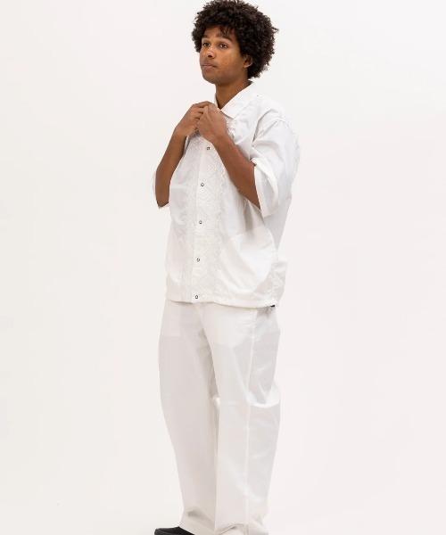 UNFRM OUTDOOR STANDARD(ユニフォームアウトドアスタンダード)の「【UNFRM OUTDOOR STANDARD:ユニフォームアウトドアスタンダード】PE TYPEWRITER AFRICAN EMBROIDERY S/S WORK SHIRT ワークシャツ 刺繍 リングドットボタン ポケット付き 裾スピンドル(シャツ/ブラウス・メンズ・ネイビー/オフホワイト・MEDIUM/LARGE/X-LARGE)」の9枚目の写真
