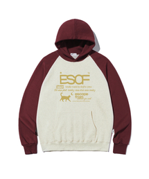 ESCAPEFROM（エスケープフロム）の「マスタードキティクルーコレクションプリントラグラン配色フードパーカーオートミール（パーカー）」