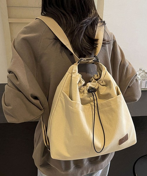 LA VORAGINE(ラ ヴォラジネ)の「3WAYA4収納可アウトポケットドロストリュックサックショルダーバッグトートバッグ(ショルダーバッグ・レディース・グリーン/ベージュ/オレンジ/ブラック・FREE)」の1枚目の写真