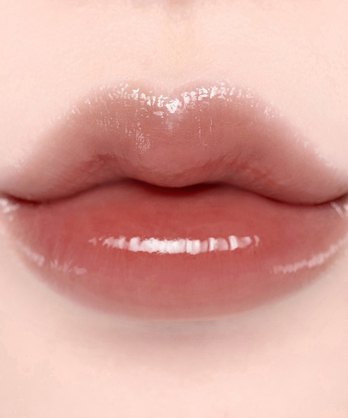 Laka(ラカ)の「ジェリーイングヌードグロス(口紅/リップティント/グロス・レディース・#303 /ももリング/#305 /みかんリング/#304 /ジンジャーリング/#302 /ぶどうリング/#301 /フィグリング/#306 /エンジェルリング/#307 /ココリング/#309 /ハートリング/#308 /ローサリング/#310 /メルバリング・FREE)」の17枚目の写真