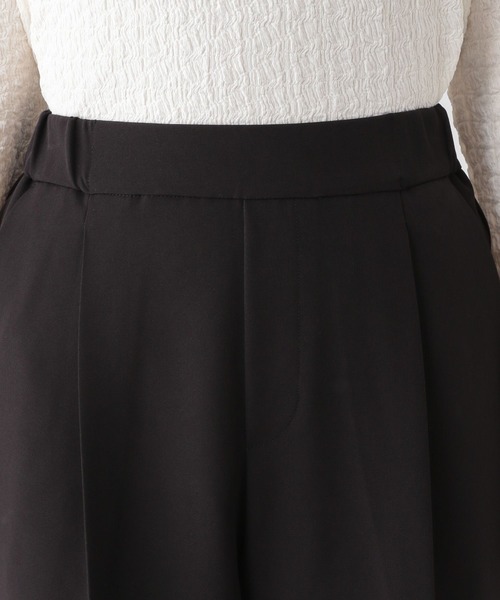 GLOBAL WORK(グローバルワーク)の「MATINEE LINE/ペプラムブラウス*パンツセット/140478(パンツドレス・レディース・ブラック/ホワイト×ブラック/ネイビー・LARGE/MEDIUM)」の15枚目の写真