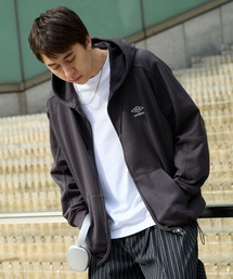 UMBRO（アンブロ）の「UMBRO/アンブロ 別注 ワンポイントロゴ刺繍 ドロスト オーバーサイズ ラグランスリーブ ダブルジップ パーカー（パーカー）」