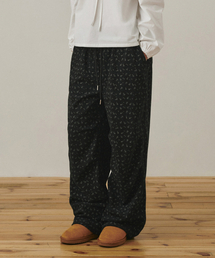 BELLOL（ベロエル）の「Flower pintuck pants BLACK（スウェットパンツ）」