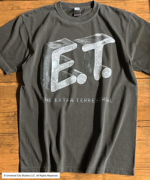minius(ミニウス)の「【E.T.】THE EXTRA-TERRESTRIAL 映画 ライセンス Tシャツ ヴィンテージ風 ストーンロゴデザイン メンズ レディース(Tシャツ/カットソー・メンズ・ブラック/ホワイト・SMALL/X-LARGE/MEDIUM/LARGE)」の1枚目の写真