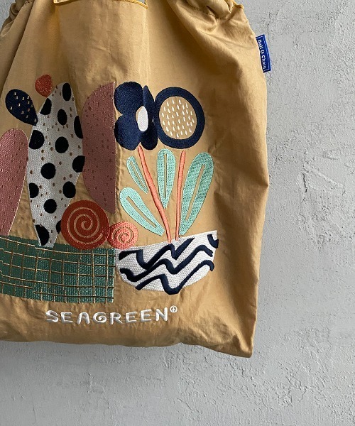 シーグリーンのトートバッグ（カラー : ブルー） LAMP LIGHT BOOKS HOTEL」とのコラボアイテムを1月27日(金)に一部店舗