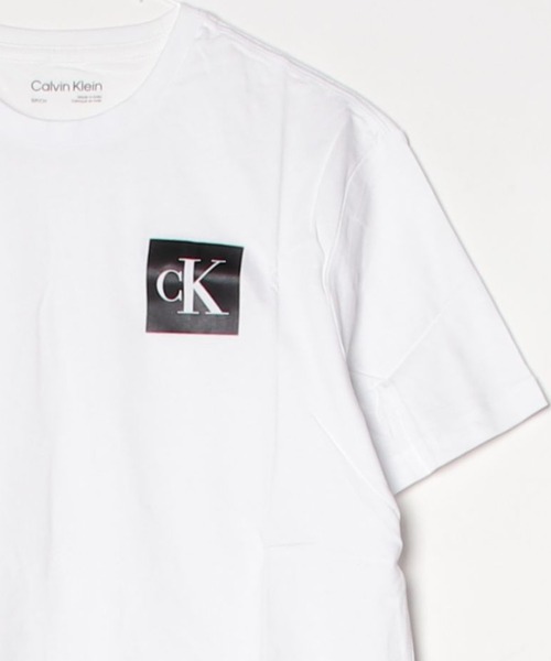Calvin Klein(カルバン・クライン)の「Calvin Klein / カルバンクライン SS MIN MONOGRAM KNOCKOUT GRAPHIC TEE ボックスロゴ CKモノグラム 半袖Tシャツ(Tシャツ/カットソー・メンズ・ホワイト・S/L/XL)」の1枚目の写真