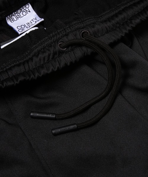 MARCELO BURLON(マルセロ・バーロン)の「RURAL CROSS LOOSE TRACK PANTS(その他パンツ・メンズ・ブラック×ブルー・M/L)」の4枚目の写真
