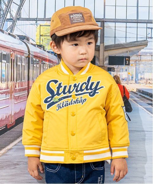 kladskap（クレードスコープ）の「恐竜スタジャン（ブルゾン・キッズ・マスタード/ネイビー・90cm/100cm/110cm/120cm/130cm）」の2枚目の写真