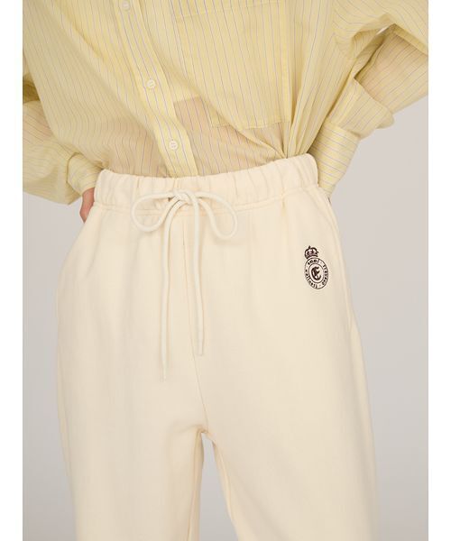 emmi（エミ）の「エンブレムロゴスウェットパンツ（スウェットパンツ・レディース・ネイビー/アイボリー・F）」の10枚目の写真