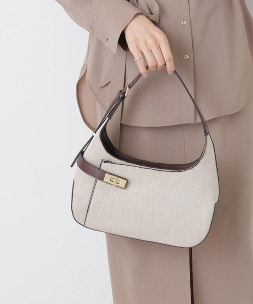 NANO universe(ナノユニバース)の「ターンロックベルトキャンバスワンハンドルバッグ(ハンドバッグ・レディース・ネイビー/ベージュ・F)」の1枚目の写真