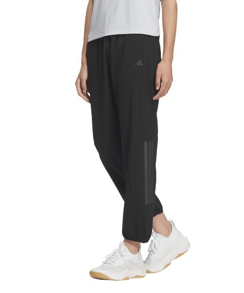 adidas(アディダス)の「アディダス adidas エッセンシャルズ プラス ルーズフィット ストレッチ ウーブン 9/10 テーパード パンツ(その他パンツ・レディース・ブラック/ネイビー・S/M/L)」の2枚目の写真