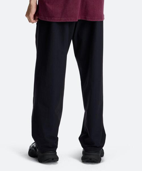 UNDER ARMOUR(アンダーアーマー)の「UAナイロン ワイド パンツ(ライフスタイル/メンズ)(その他パンツ・メンズ・ブラック系・XL/M/L)」の2枚目の写真