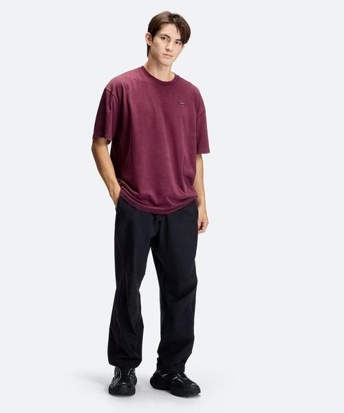 UNDER ARMOUR(アンダーアーマー)の「UAナイロン ワイド パンツ(ライフスタイル/メンズ)(その他パンツ・メンズ・ブラック系・XL/M/L)」の4枚目の写真