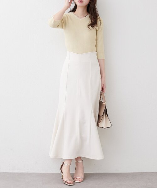 natural couture(ナチュラルクチュール)の「【1/1~4限定受注販売】〈mizumami〉リボンチャーム5分袖ニット(ニット/セーター・レディース・アイボリー/イエロー/ピンク/ブルー/ネイビー/ブラック・FREE)」の21枚目の写真