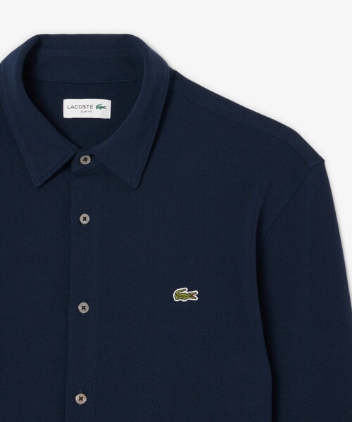 LACOSTE(ラコステ)の「スリムフィット オーガニックコットン鹿の子地長袖シャツ(シャツ/ブラウス・メンズ・ライトブルー/ネイビー/ホワイト・38/39/41/40)」の1枚目の写真
