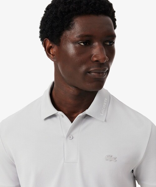 LACOSTE（ラコステ）の「ネームジャカードカラー ストレッチ鹿の子 半袖ポロシャツ（ポロシャツ・メンズ・アクア/ライトグレー/ホワイト・5/4/2/3）」の6枚目の写真