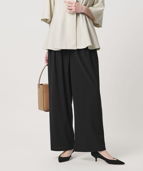 UNITED ARROWS(ユナイテッドアローズ)の「ジャージー タック ワイドパンツ ‐ウォッシャブル‐(スラックス・レディース・ターコイズブルー系/ブラック/ダークブラウン/ネイビー・38/36)」の2枚目の写真