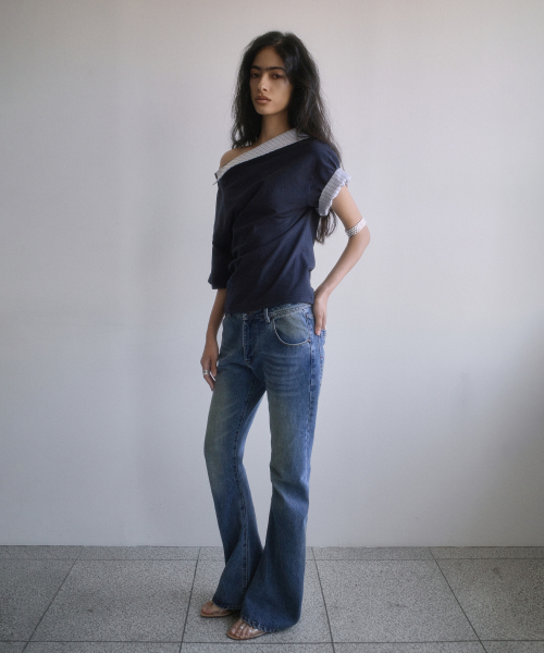 PORTERNA(ポルテナ)の「TWISTED BOOTS CUT DENIM JEANS-BLUE(デニムパンツ・レディース・その他・SMALL/MEDIUM/LARGE)」の3枚目の写真