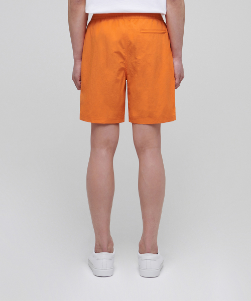 MUSINSA STANDARD（ムシンサスタンダード）の「ナイロンバンディングショーツ_7.5インチ [オレンジ]（その他パンツ・メンズ・その他・26）」の2枚目の写真
