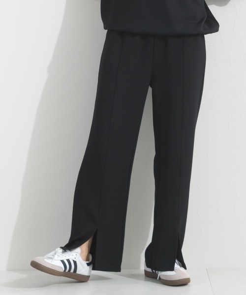 OMNES(オムネス)の「ソフトポンチフロントスリットパンツ 花粉リリース付(その他パンツ・レディース・ブラック/ベージュ・FREE)」の1枚目の写真