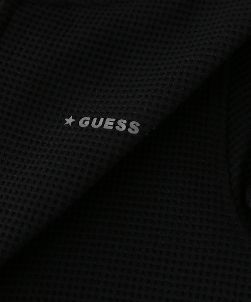 GUESS JEANS(ゲスジーンズ)の「GUESS JEANS / ゲス ジーンズ STAR PRINT WAFFLE HOODIE(パーカー・レディース・ブラック・SMALL)」の9枚目の写真