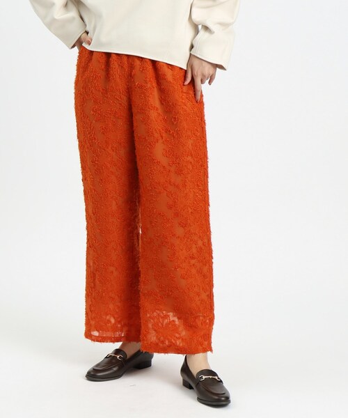 OPAQUE.CLIP(オペークドットクリップ)の「◆フラワージャカードイージーパンツ【洗濯機洗い可】(その他パンツ・レディース・オレンジ/ブラック・42/40/36/38)」の1枚目の写真