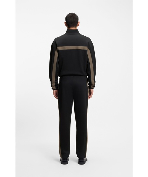 HUGO（ヒューゴ）の「リラックスフィット トラックスーツボトムス ロゴテープ（その他パンツ・メンズ・ブラック・XL/L/S/XS/M/XXL）」の4枚目の写真