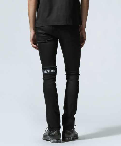 RAF SIMONS（ラフシモンズ）の「Narrow fit jeans w/text elastic on