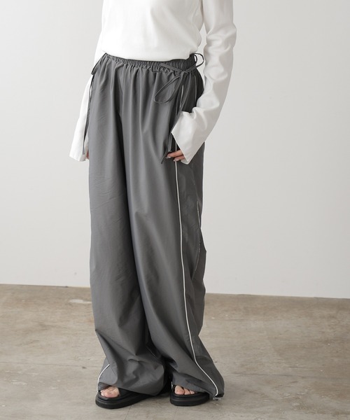 AO2(アオズ)の「△Side ribbon track pants / サイドリボン AO2(アオズ)の「△Side ribbon track pants / サイドリボン