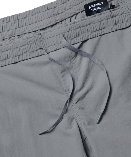 MUSINSA STANDARD（ムシンサスタンダード）の「ナイロンバンディングショーツ_7.5インチ [ライトグレー]（その他パンツ・メンズ・その他・38/36/34/26/28/32/30）」の3枚目の写真