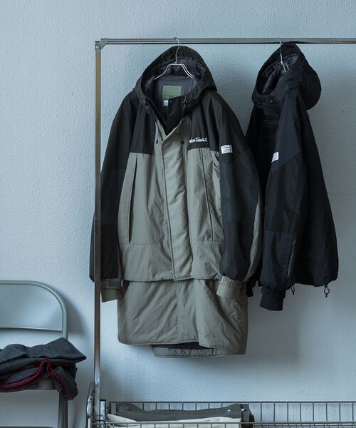 WILD THINGS（ワイルドシングス）の「【elephant TRIBAL fabrics × WILD THINGS for ADAM ET ROPE'】EX DETACHABLE MONSTER PARKA（ダウンジャケット/コート・メンズ・カーキ/ブラック・L/M）」の9枚目の写真