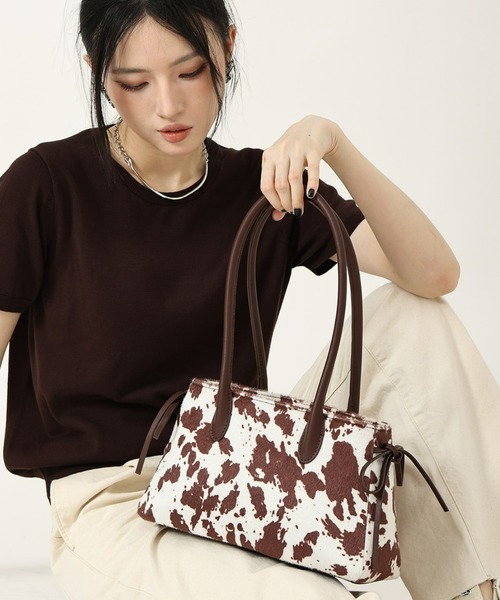 style code(スタイルコード)の「ZOZO限定【STYLE CODE/スタイルコード】カウ柄ハラコ風ボストンバッグ(ボストンバッグ・レディース・ブラウン/ブラック・FREE)」の1枚目の写真