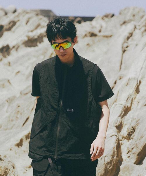 CMF OUTDOOR GARMENT(シーエムエフアウトドアガーメント)の「CMF OUTDOOR GARMENT/シーエムエフ アウトドアガーメント 別注 15 STEP VEST(ベスト・メンズ・ブラック/その他24/ブラウン・M/L)」の1枚目の写真