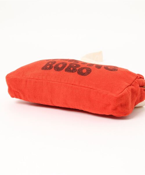 BOBO CHOSES（ボボショーズ）の「Talking Bobo belt pouch（ボディバッグ/ウエストポーチ・キッズ・レッド・ONE SIZE）」の4枚目の写真