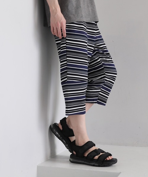 TopIsm(トップイズム)の「リップル素材 総柄7分丈パンツ(その他パンツ・メンズ・その他2/その他5/その他1/その他4/その他3・M/LL/L)」の1枚目の写真