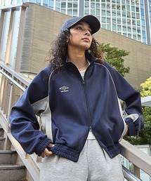 UMBRO（アンブロ）の「UMBRO/アンブロ 別注 ワンポイントロゴ刺繍 パイピング ラグランスリーブ ダブルジップ トラックジャケット（ジャージ）」